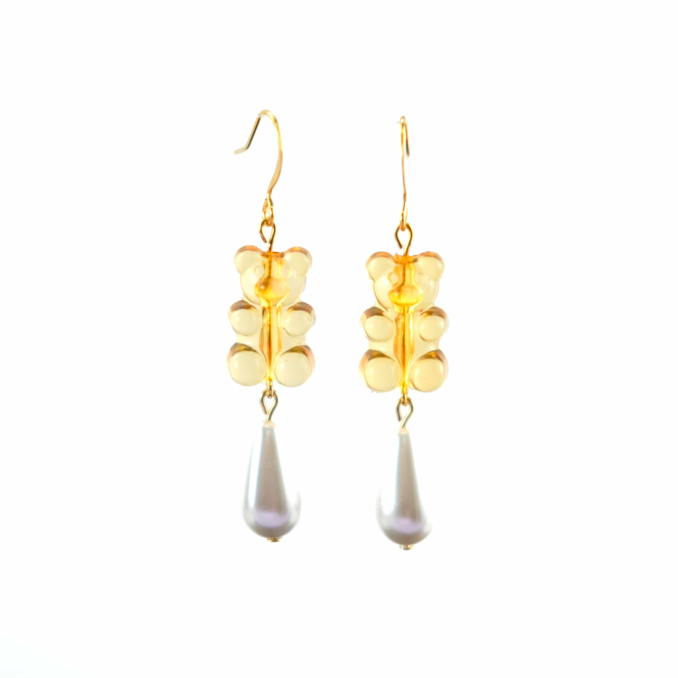 Nostalgic orange gummy bear dangly earrings with elegant pearl drops #color_orange
