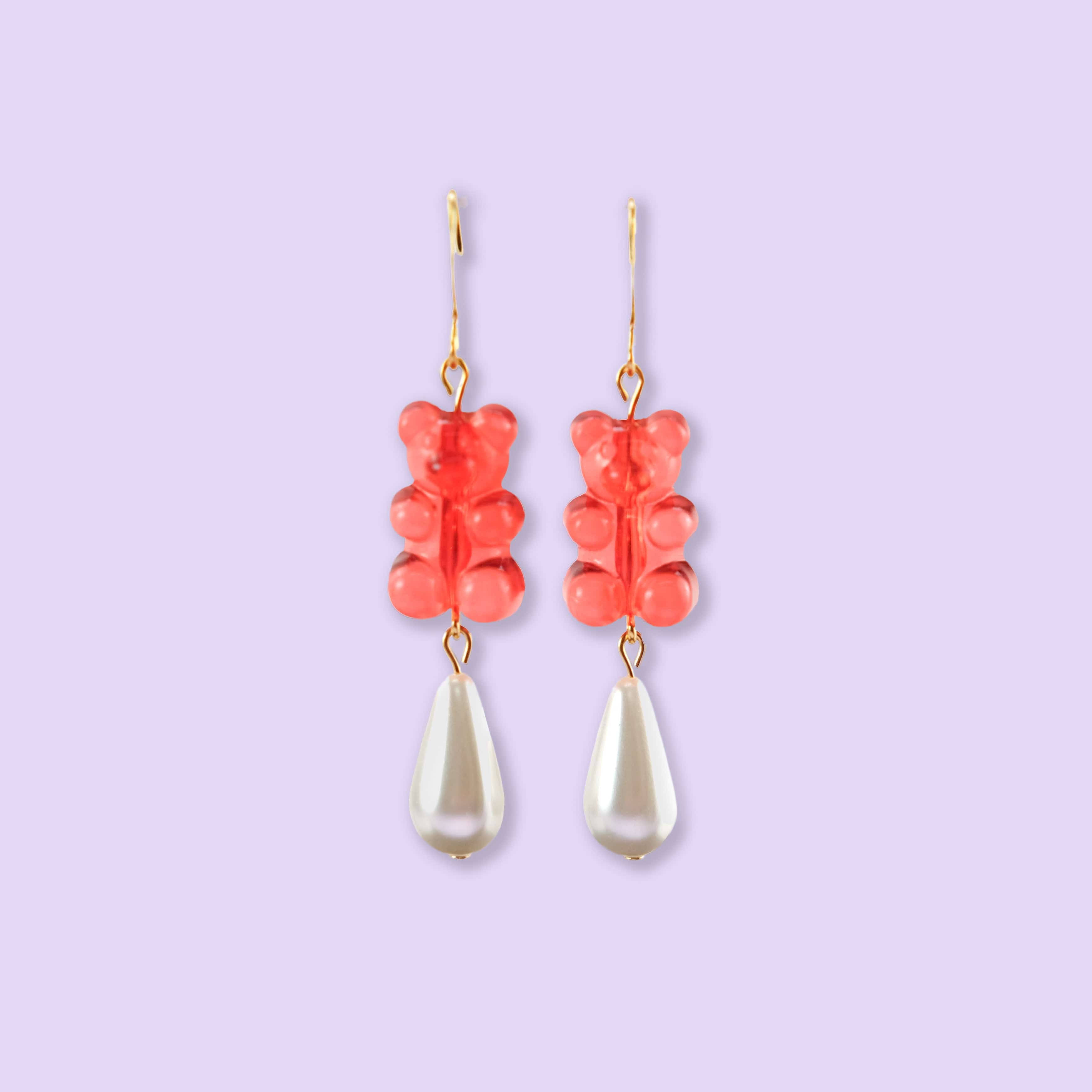 Nostalgic red gummy bear dangly earrings with elegant pearl drops #color_red