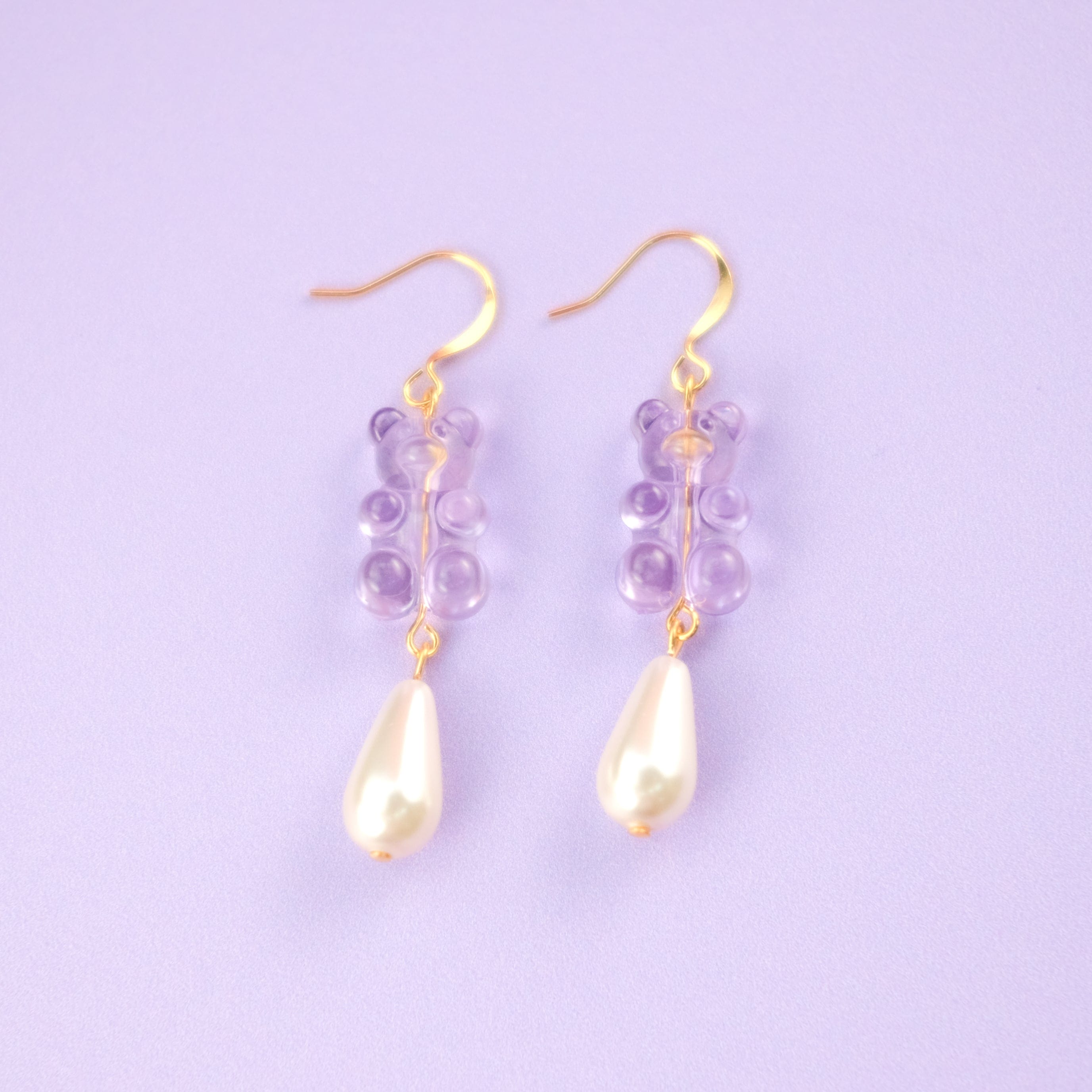Nostalgic lavender gummy bear dangly earrings with elegant pearl drops #color_lavender