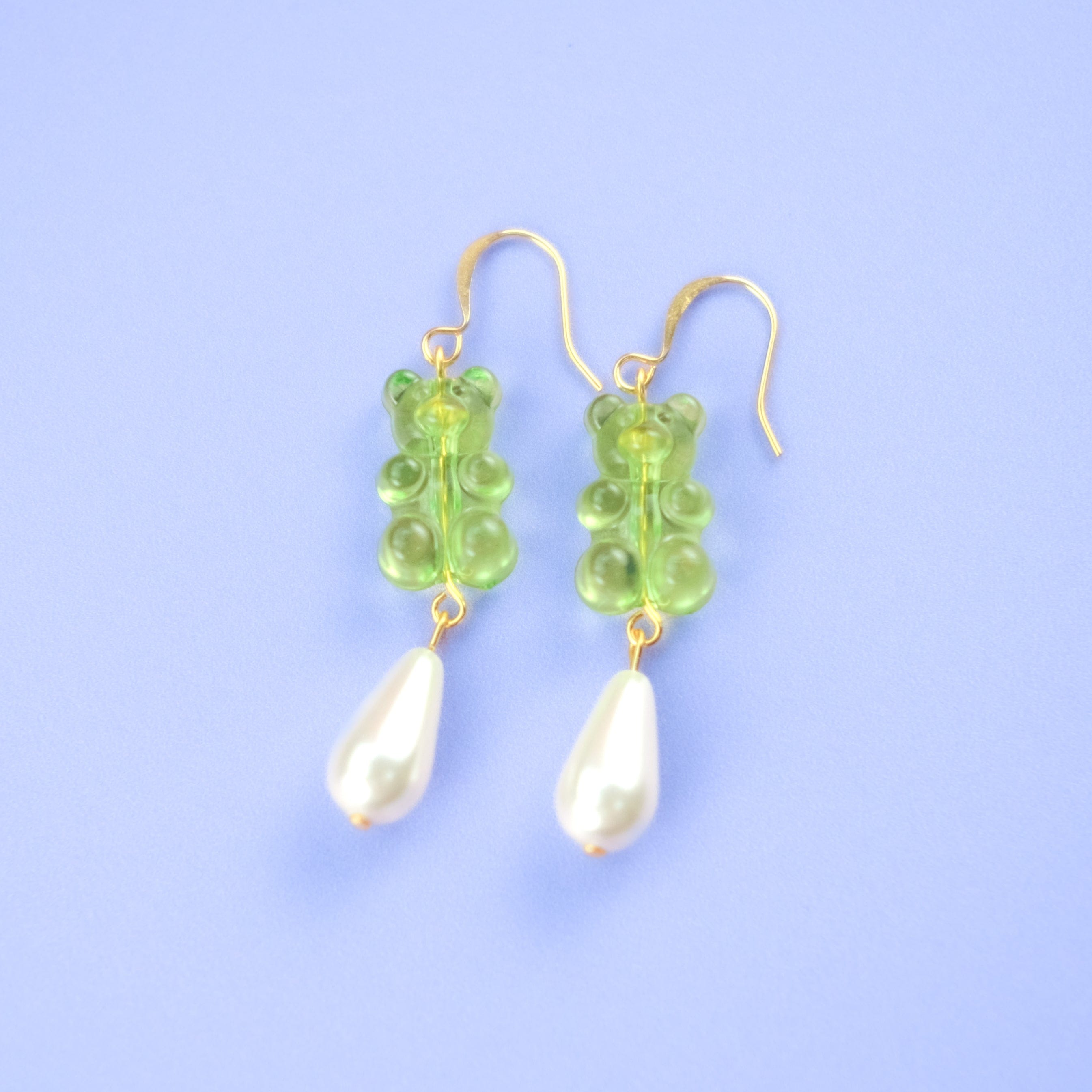 Nostalgic lime green gummy bear dangly earrings with elegant pearl drops #color_lime-green