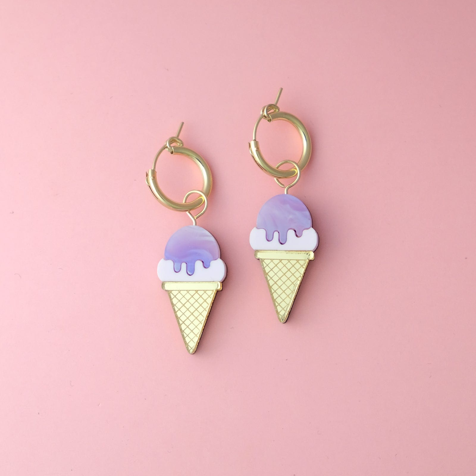 Ube ice cream cone hoop earrings by By Chavelli, featuring a dainty gold hoop with a cute acrylic ice cream cone charm in soft lavender purple #color_ube