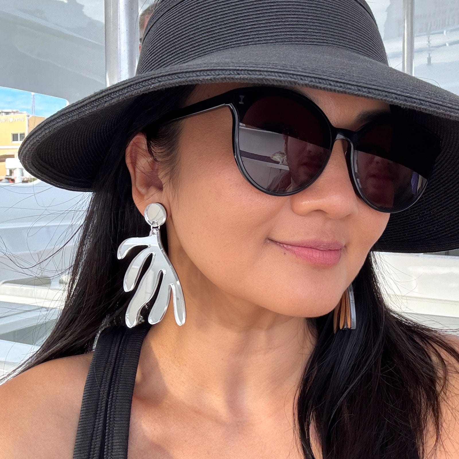Modern Art inspired statement earrings. Matisse dangly statement earrings in silver mirrored acrylic #color_silver-mirror