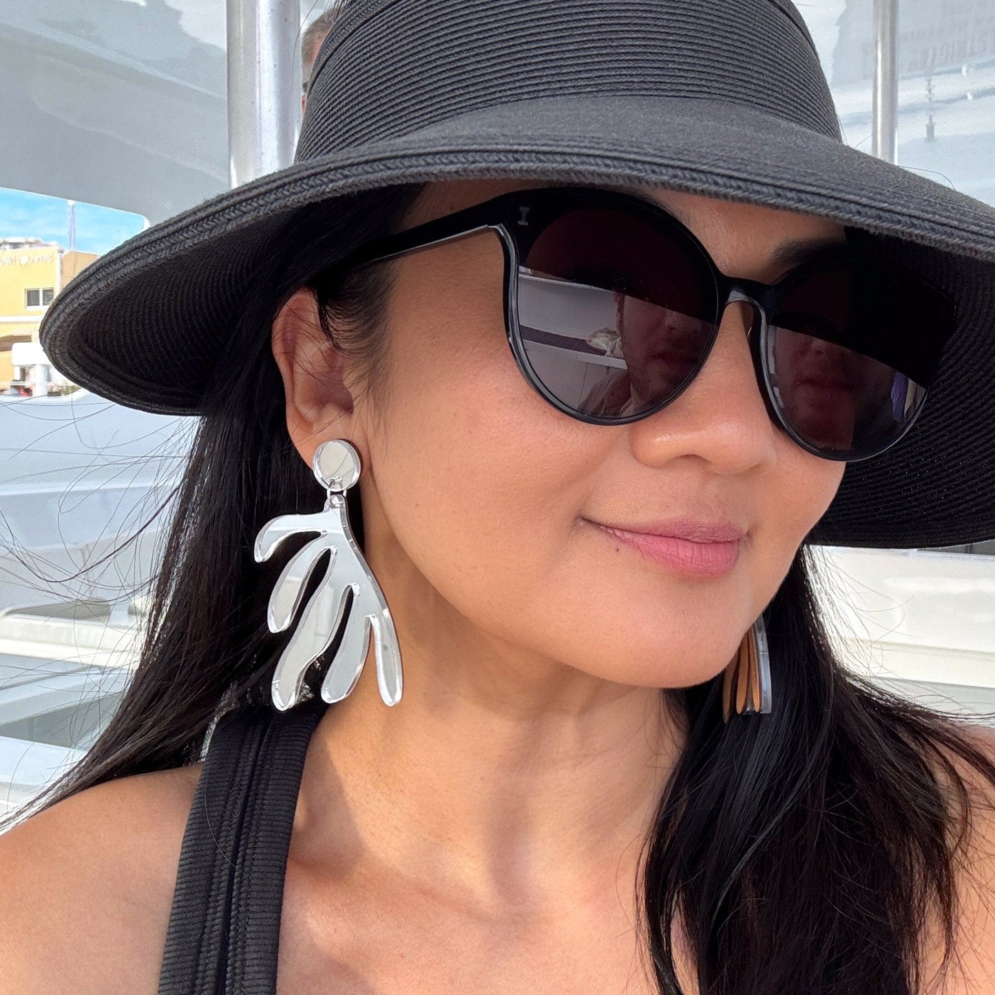 Modern Art inspired statement earrings. Matisse dangly statement earrings in silver mirrored acrylic #color_silver-mirror
