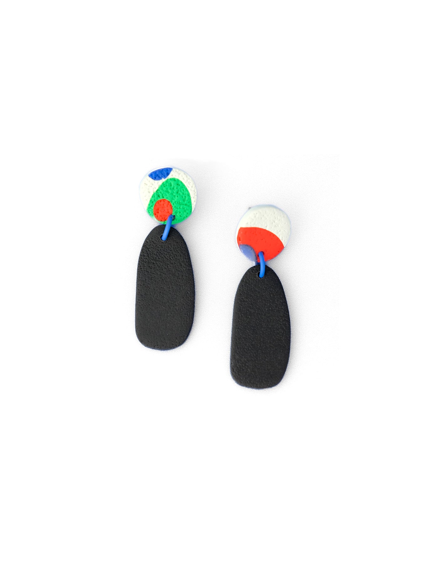 Multicolor art-inspired dangles, textured, lightweight, playful, blue connector joining patterned white discs to black pebble drops #color_black-multi