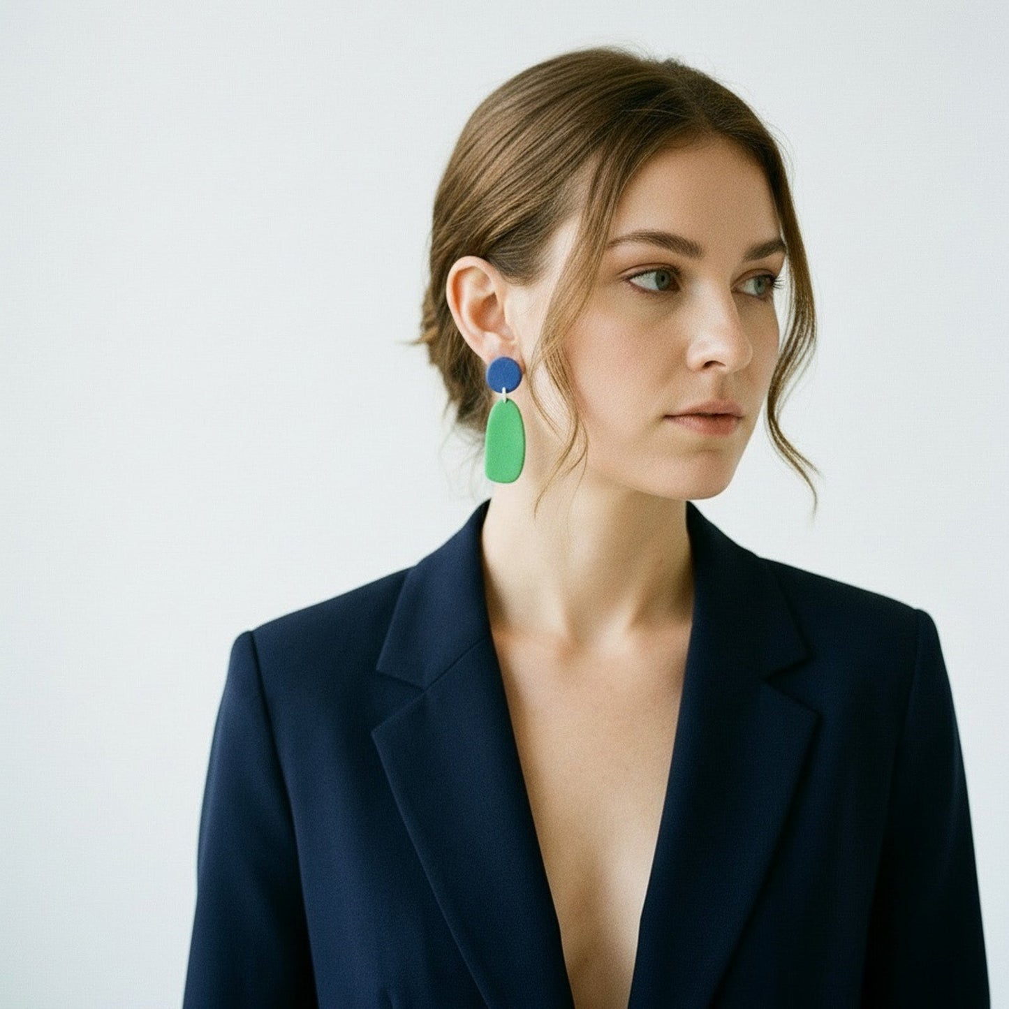 Two-tone blue/green dangle earrings, smooth yet speckled texture, lightweight swing, organic pebble shapes #color_blue-green