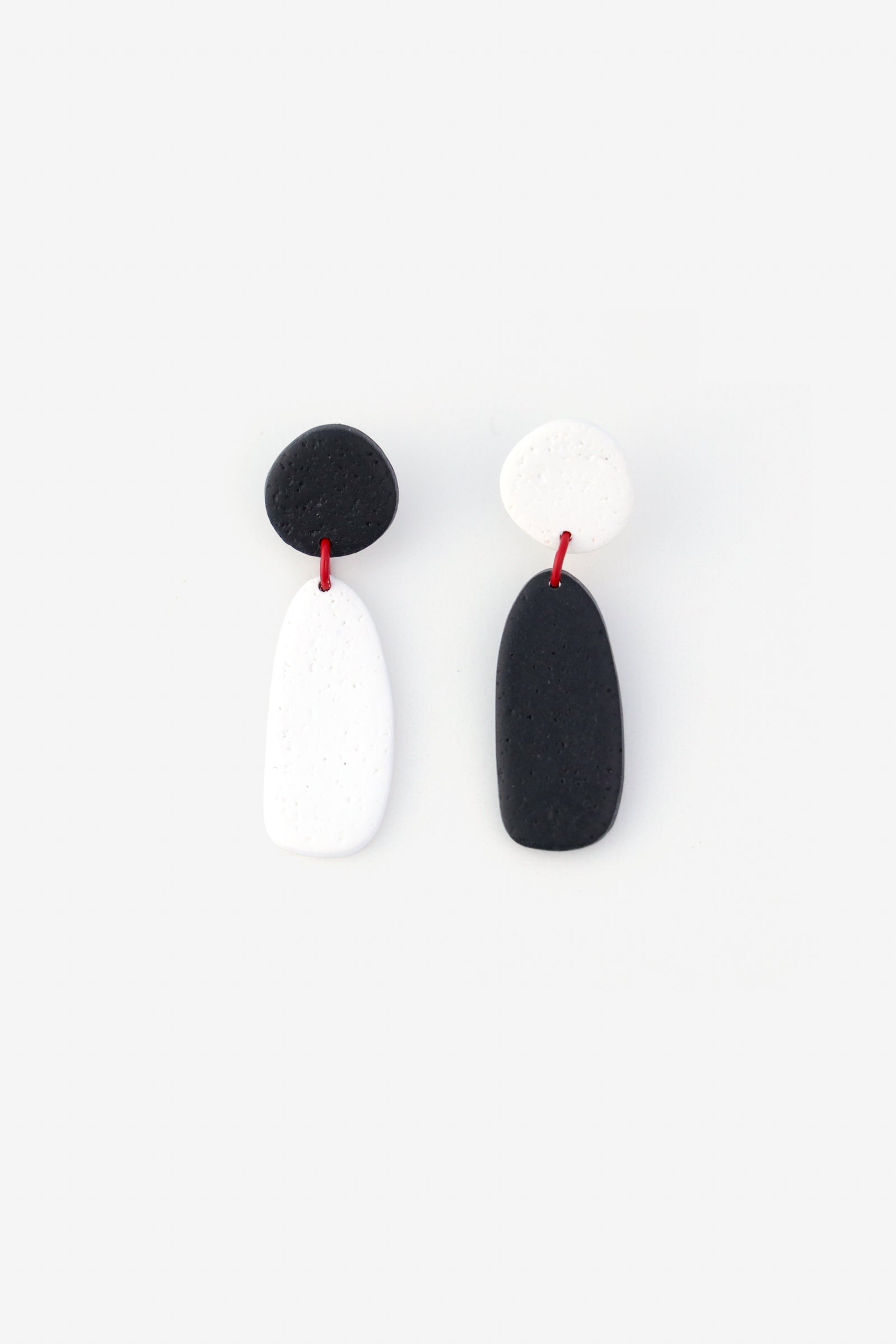 Artsy black and white Miro inspired lightweight dangly earrings with red accents