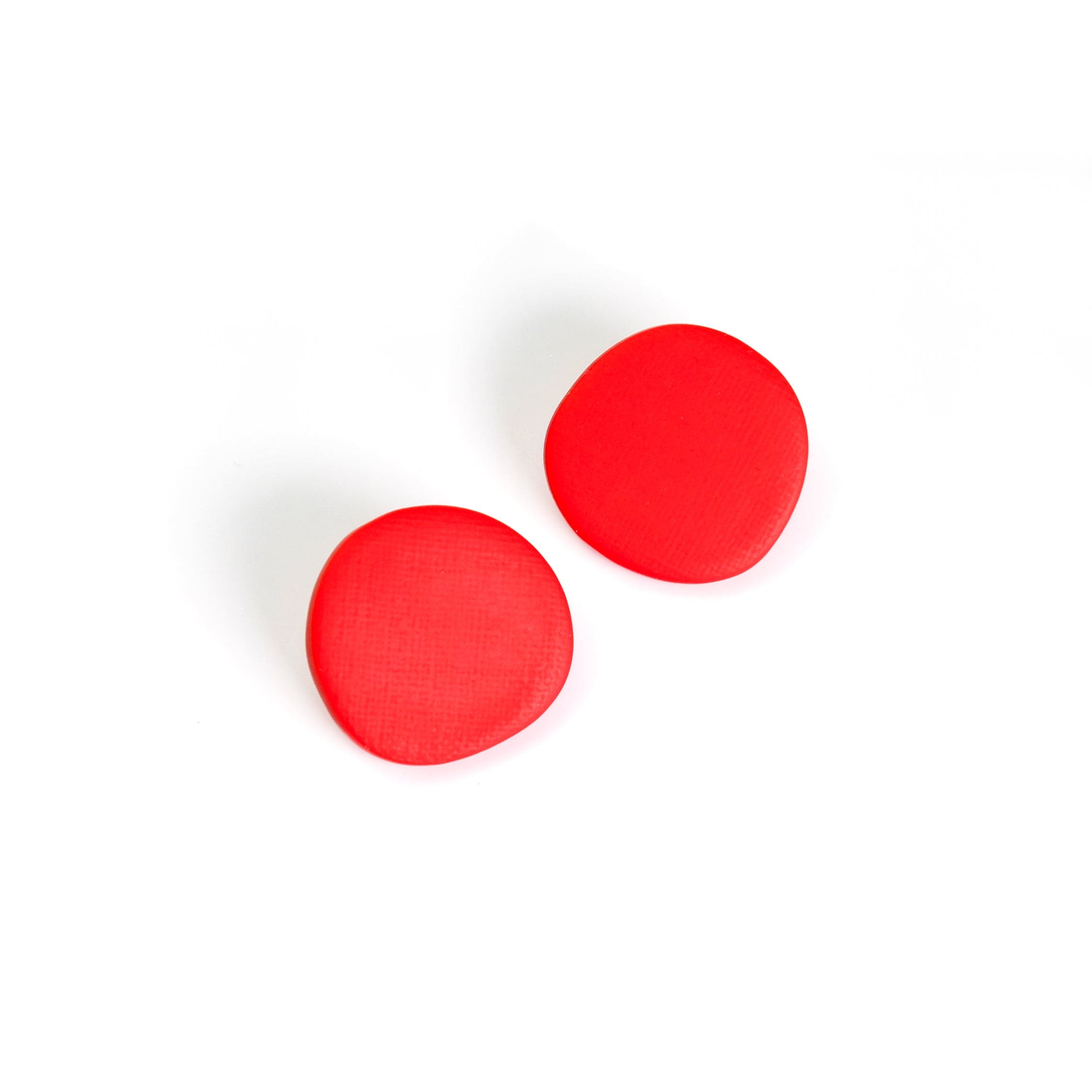 Miro inspired organic round shaped studs with canvas texture in red #color_red