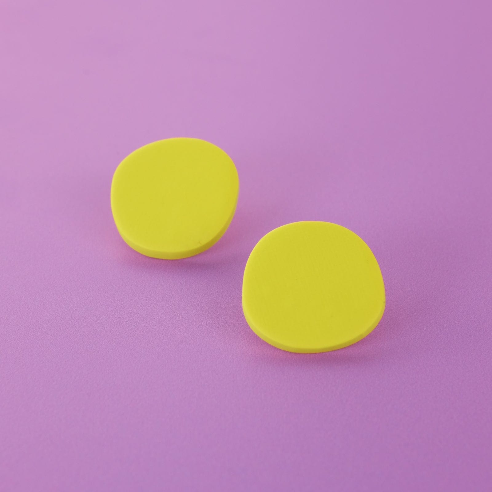 Miro inspired organic round shaped studs with canvas texture in yellow #color_yellow