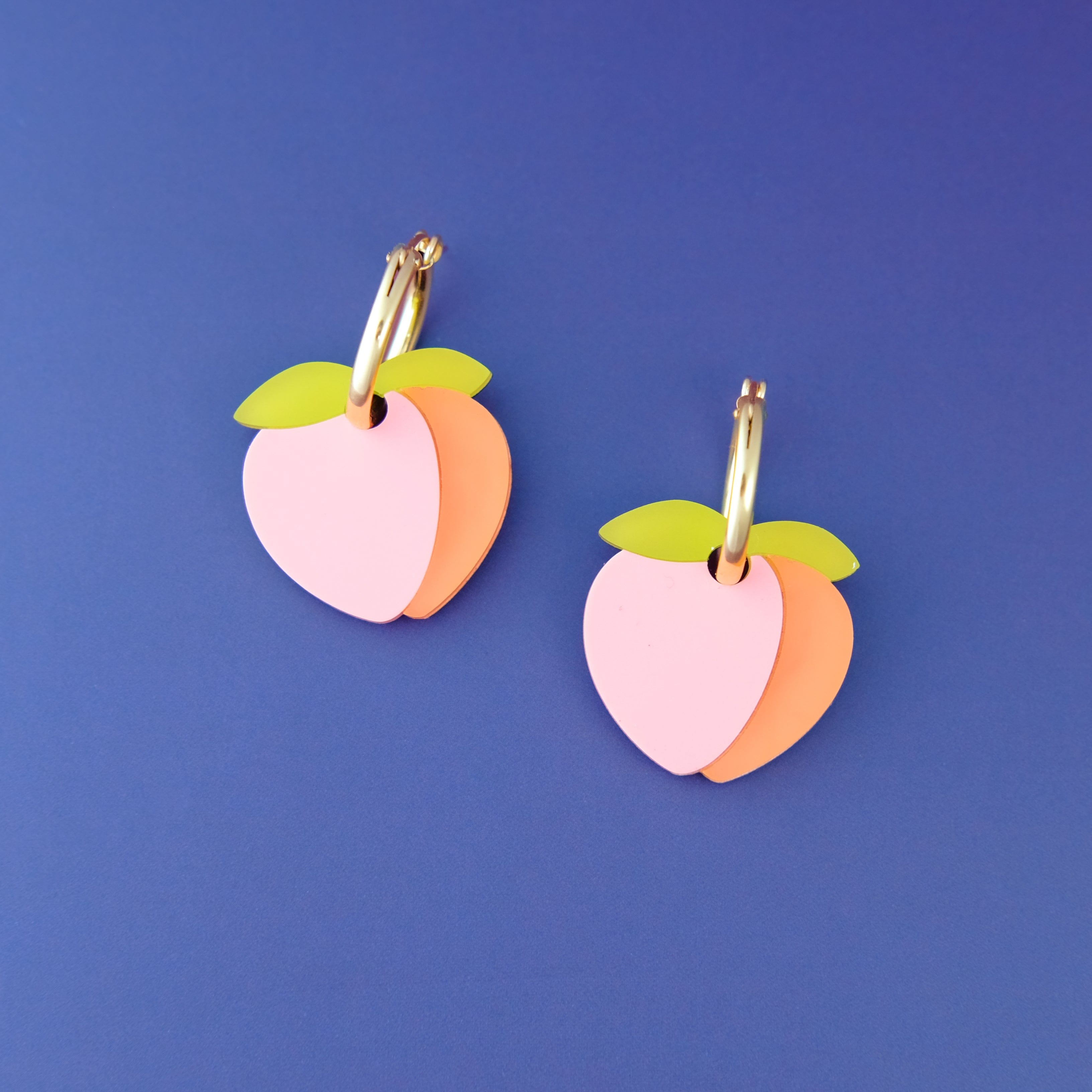 Cute peach dangly hoop earrings