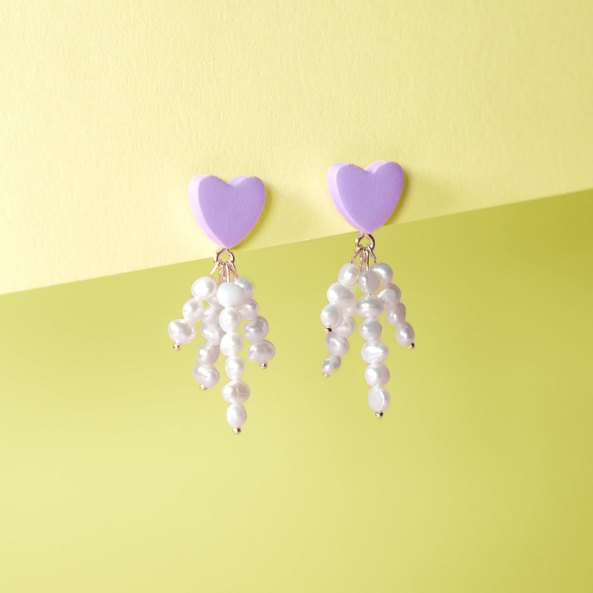 Elegant and fun pearl tassel dangly earrings with a lavender colored hearts and 14k gold-filled posts #color_lavender