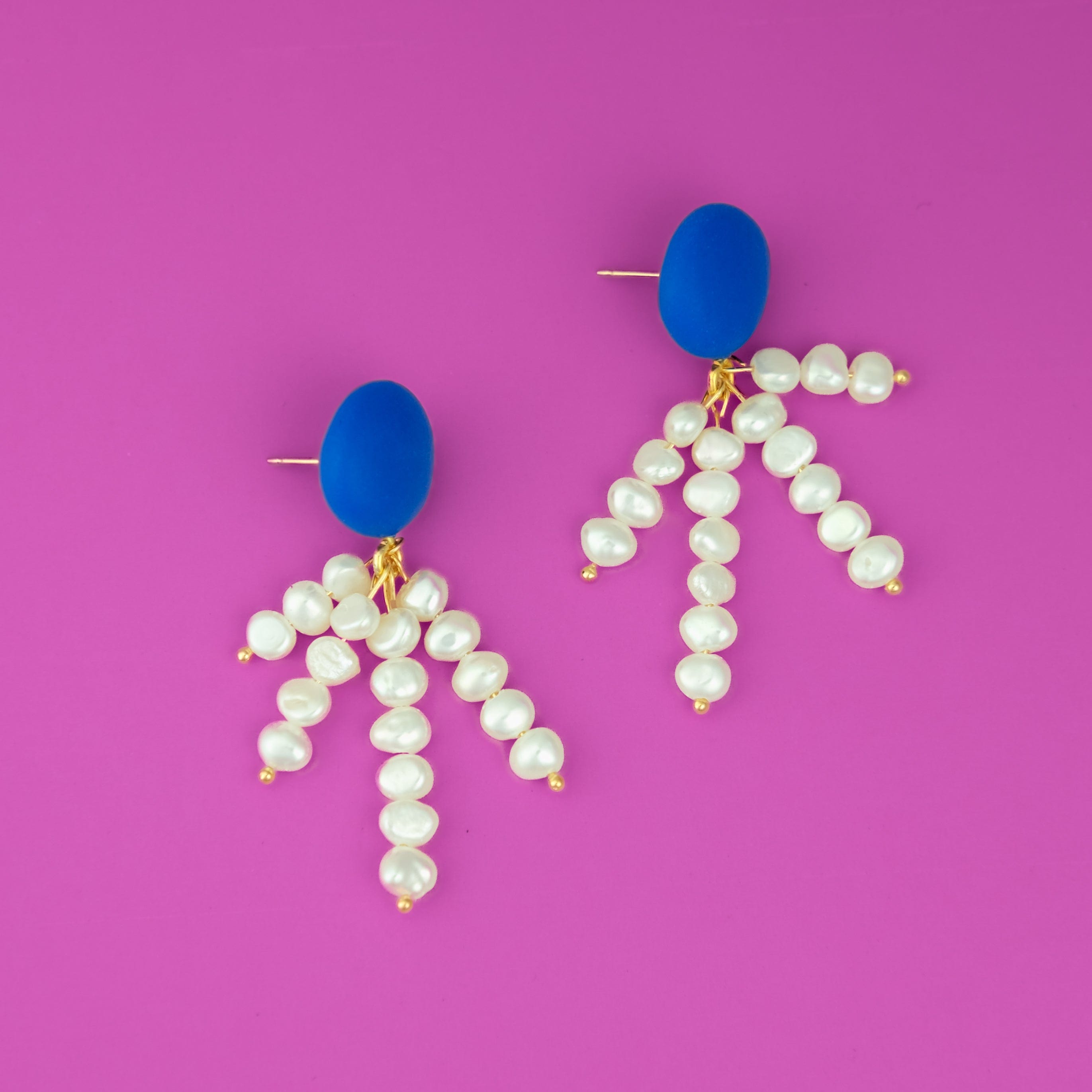 Elegant and fun pearl tassel dangly earrings with a pop of blue color and 14k gold-filled posts #color_blue