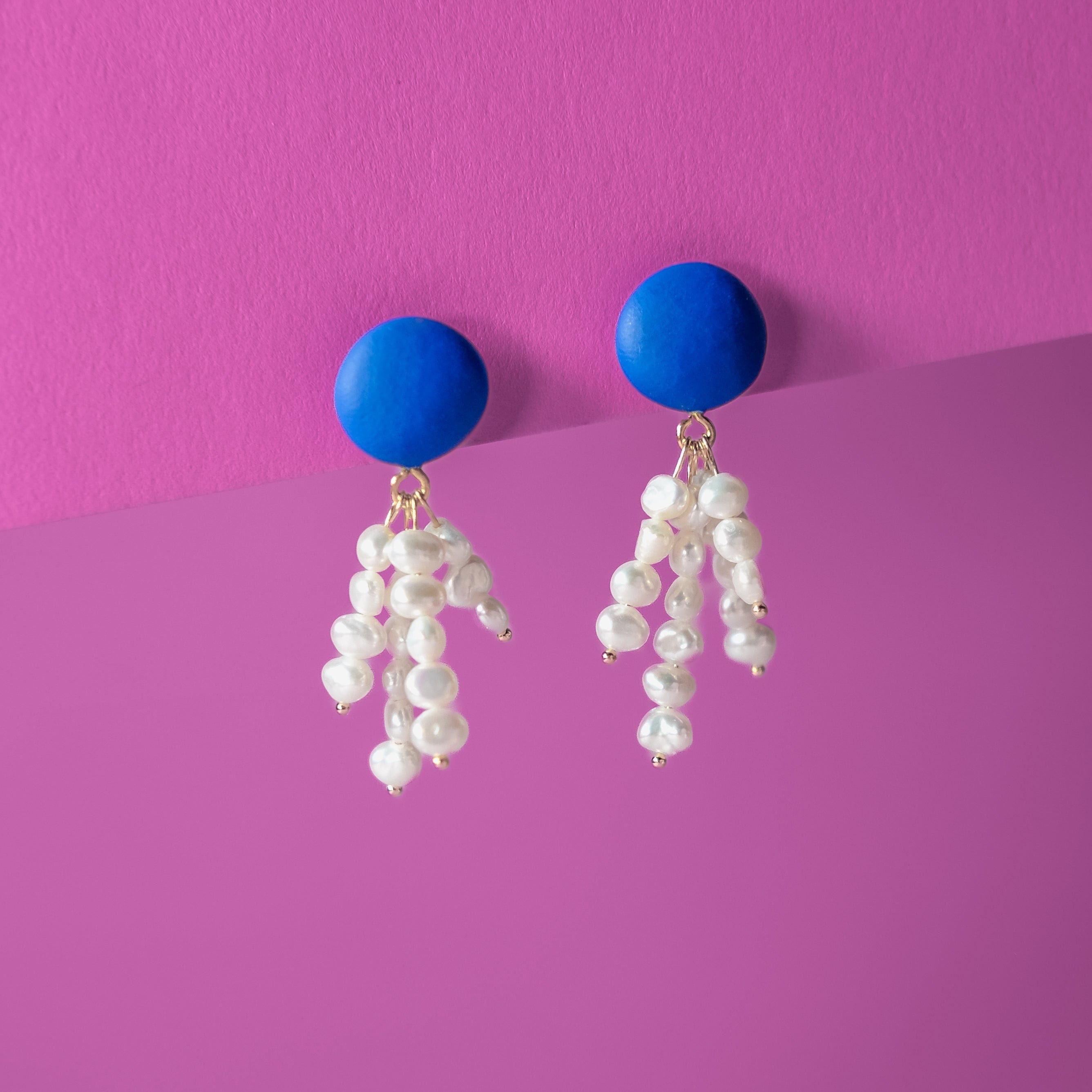 Elegant and fun pearl tassel dangly earrings with a pop of blue color and 14k gold-filled posts #color_blue