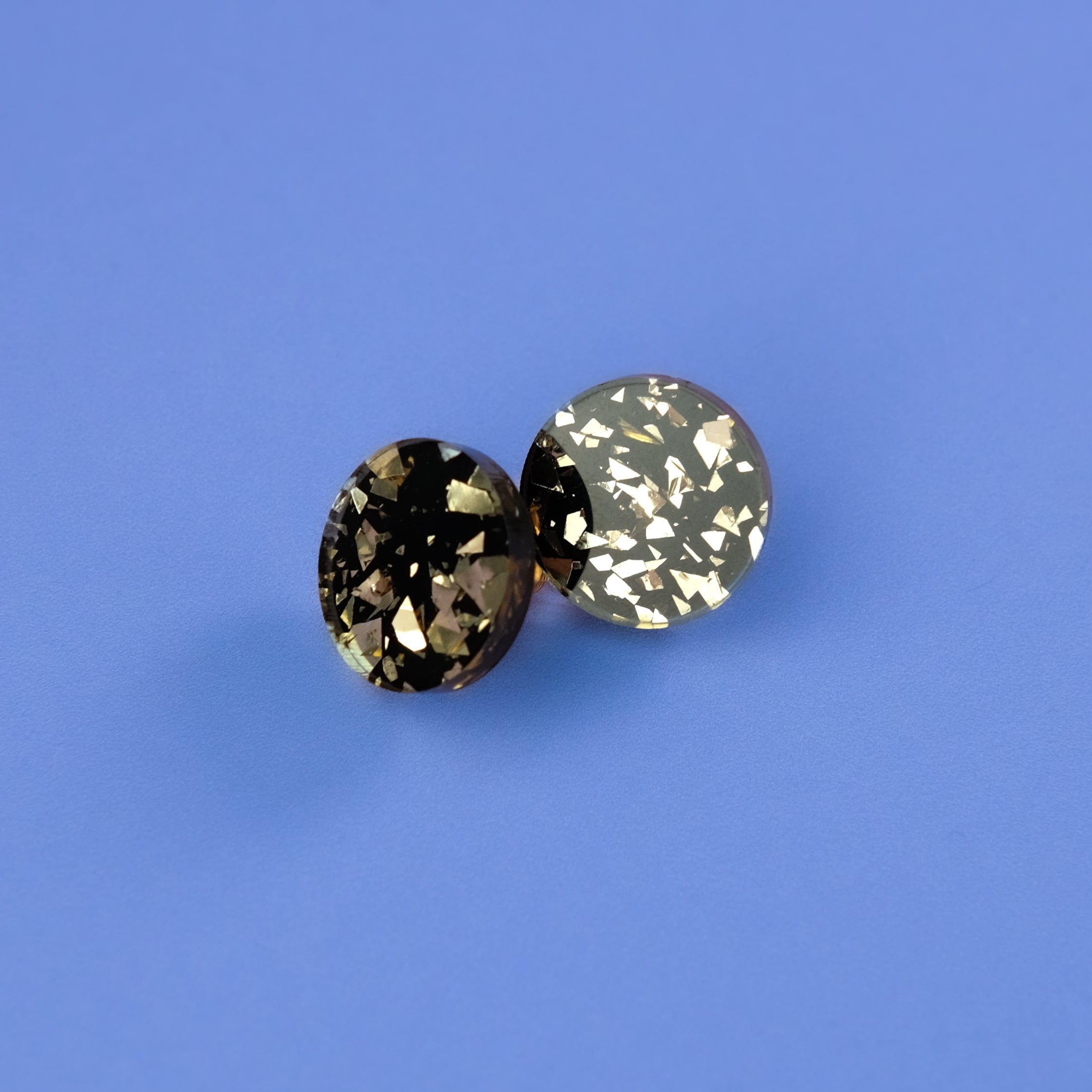 Glam and glitzy Black and Gold chunky glitter studs!