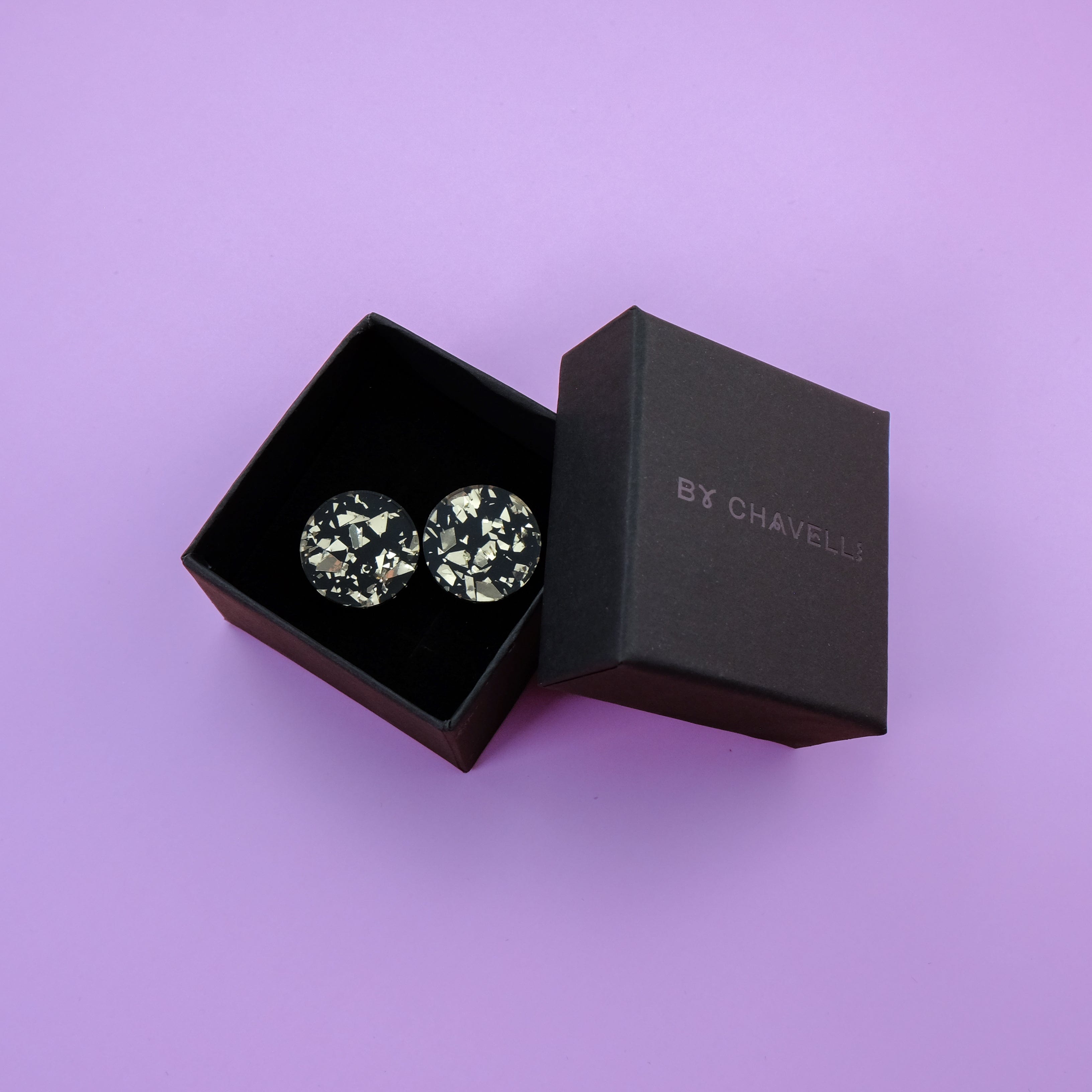 Glam and glitzy Black and Gold chunky glitter studs! 