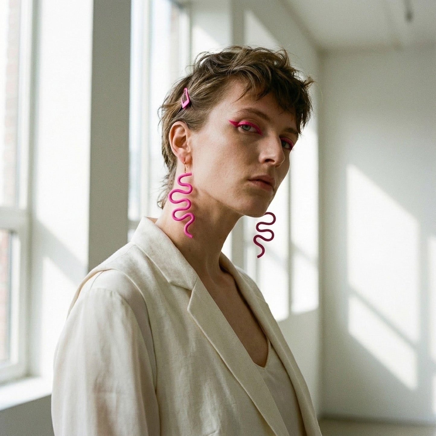 Hot pink wavy statement earrings, smooth finish, airy, elongated zigzag shape, gold fishhook findings #color_hot-pink