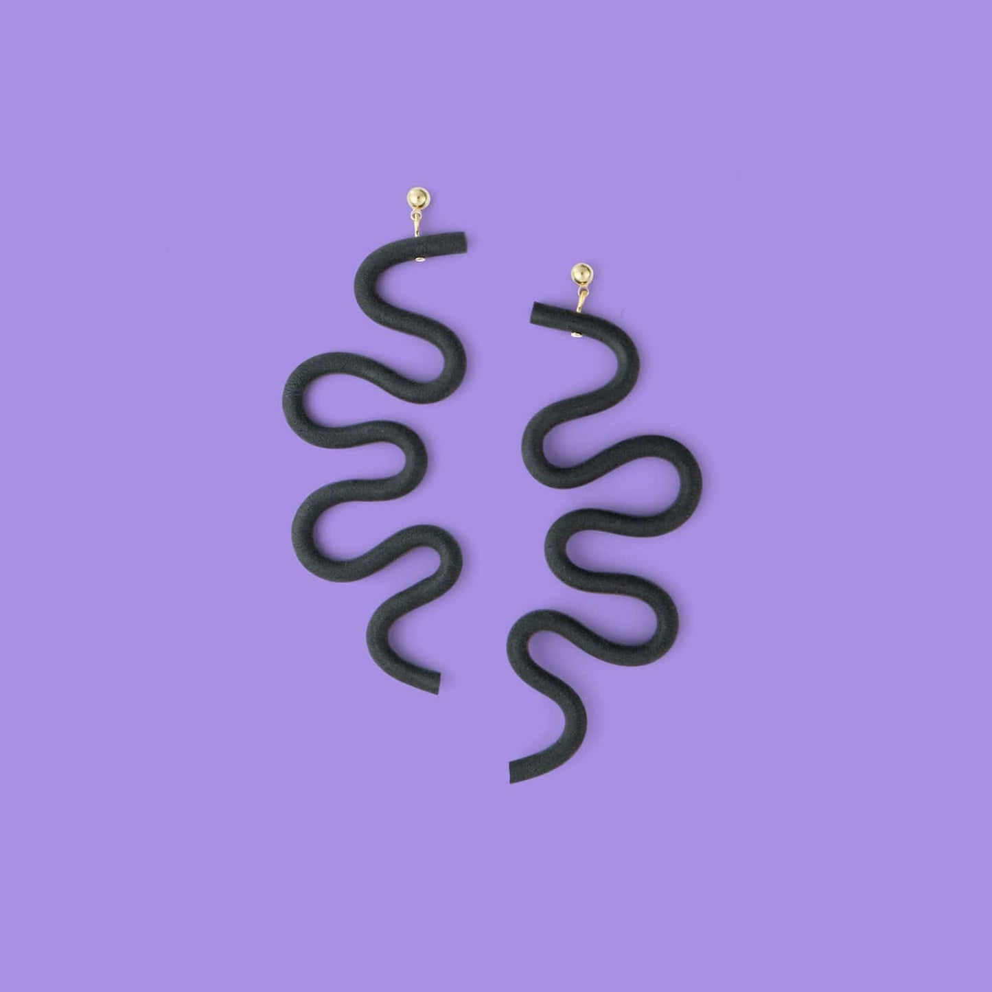 Tube Squiggle dangly statement earrings small in black #color_black