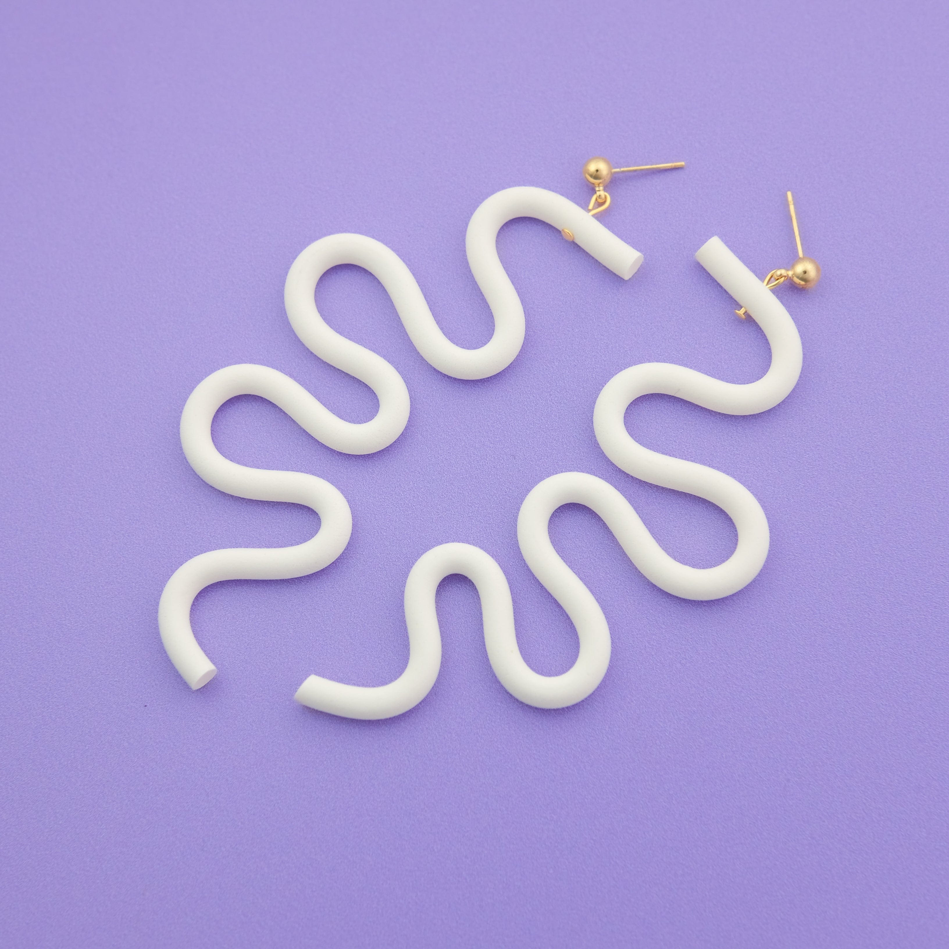 Tube Squiggle dangly earrings small in white #color_white