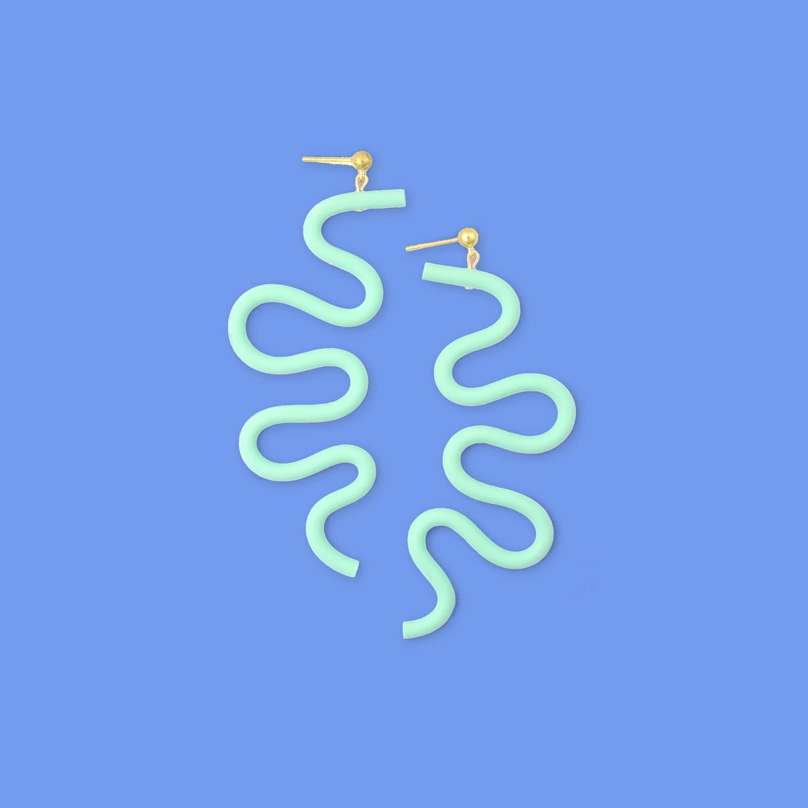 Tube Squiggle dangly statement earrings small in mint green #color_mint-green