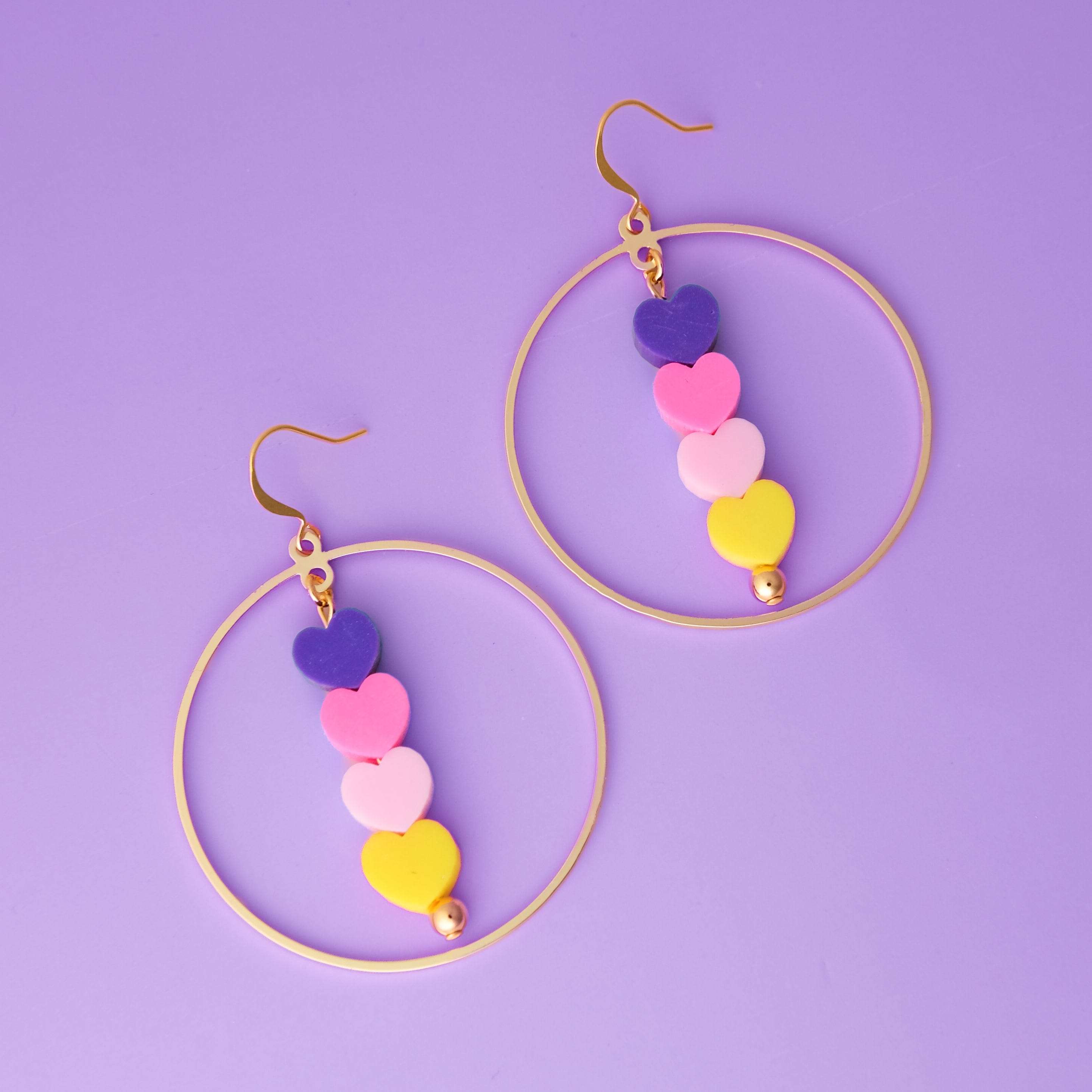 Tiny hearts halo hoop dangly earrings #color_sunsets