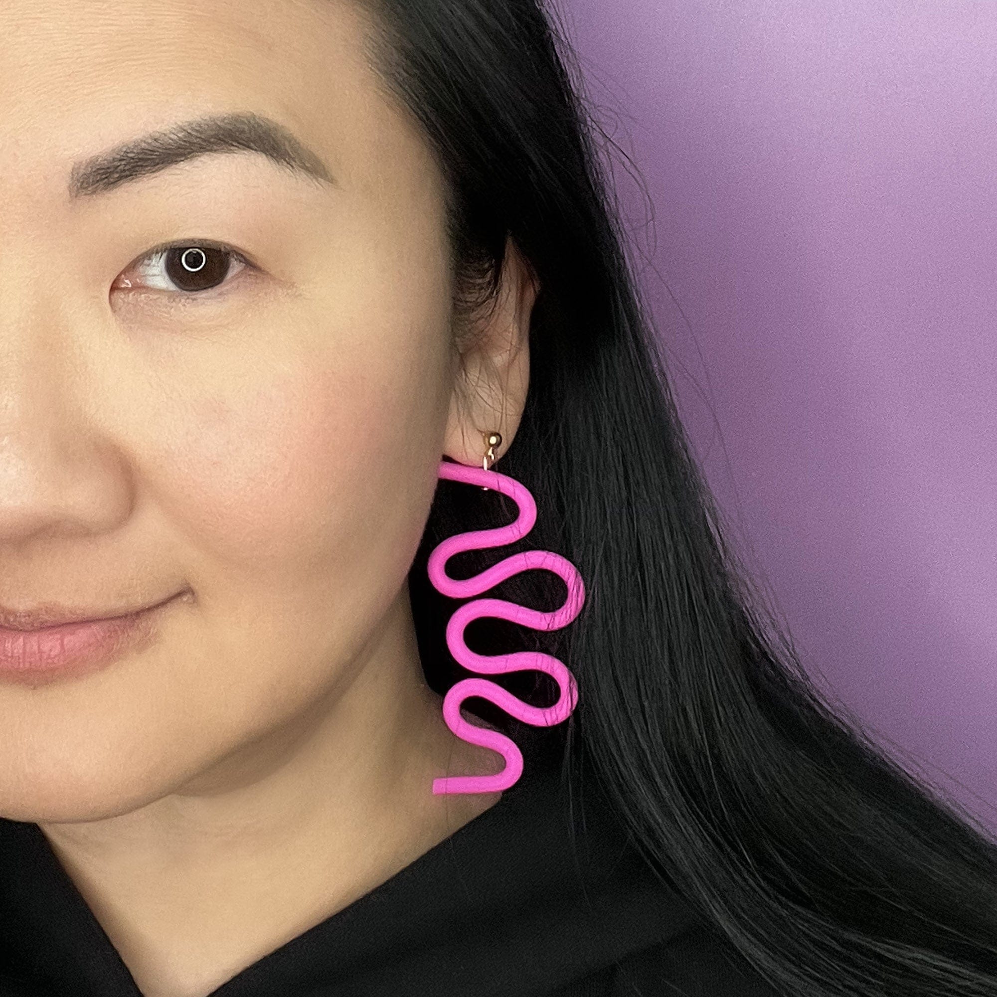 Tube Squiggle dangly earrings small in hot pink #color_hot-pink