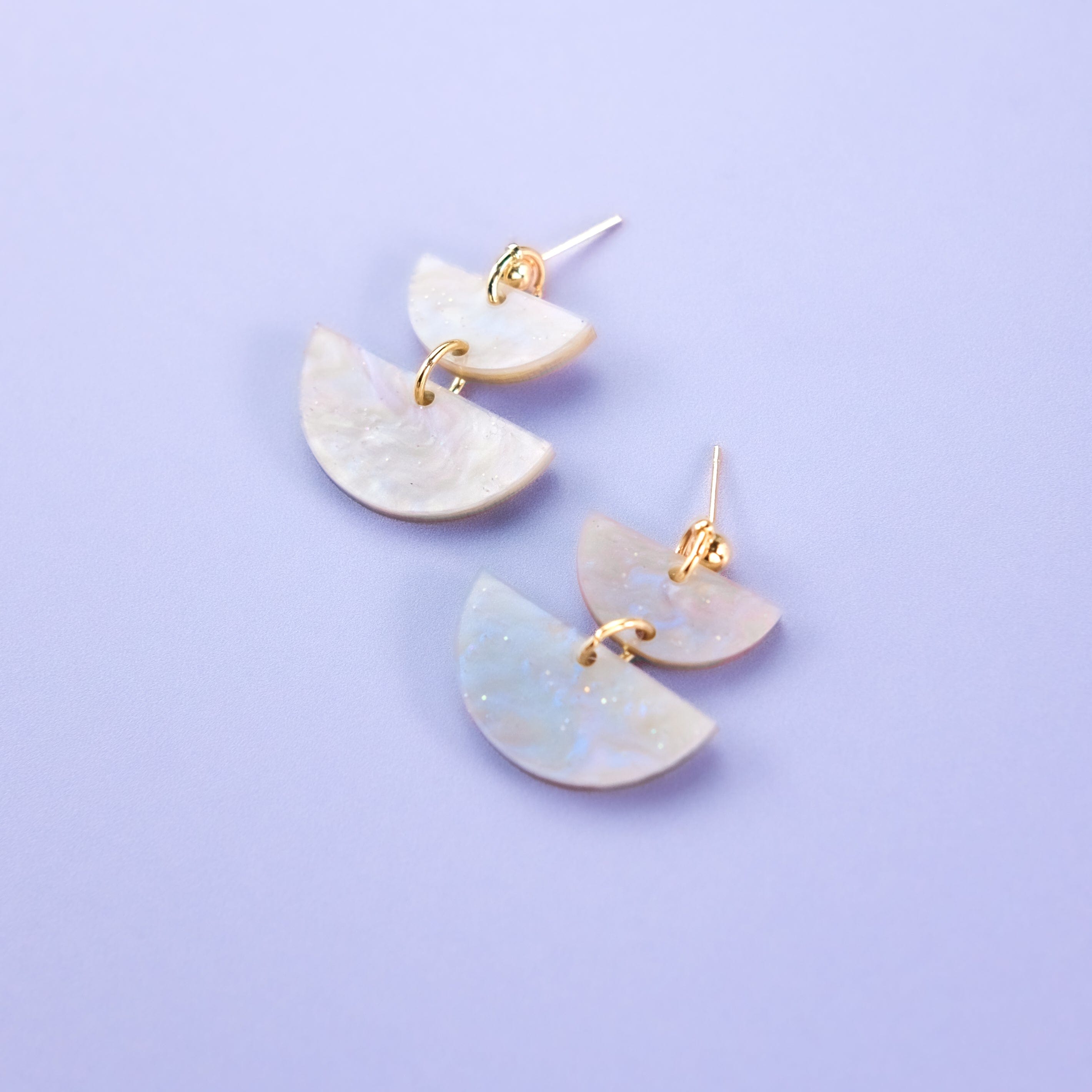 Twin Luna cute dangly half-moon shaped earrings in dusty pearl lavender #color_dusty-pearl-lavender