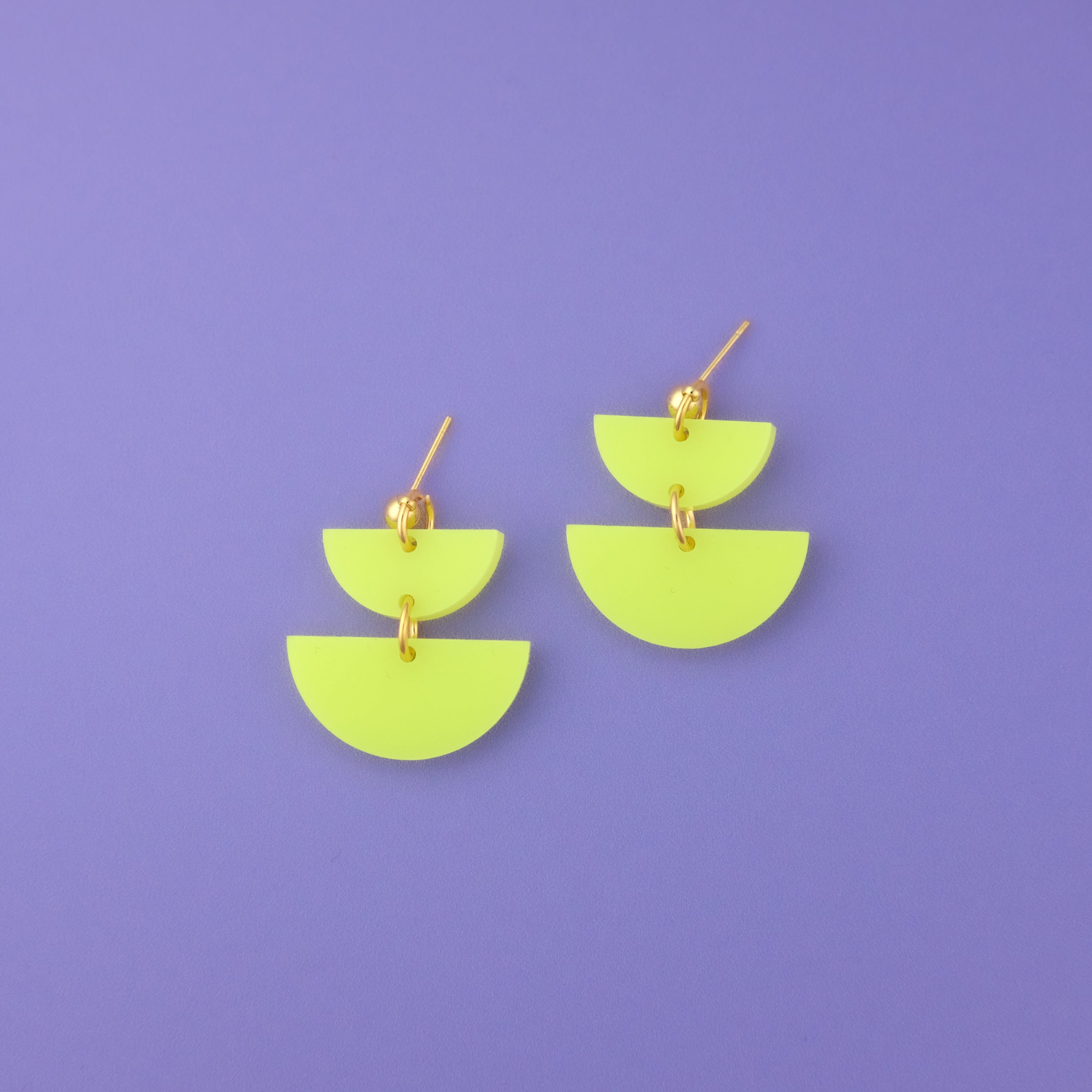 Twin Luna cute dangly half-moon shaped earrings in neon yellow #color_neon-yellow