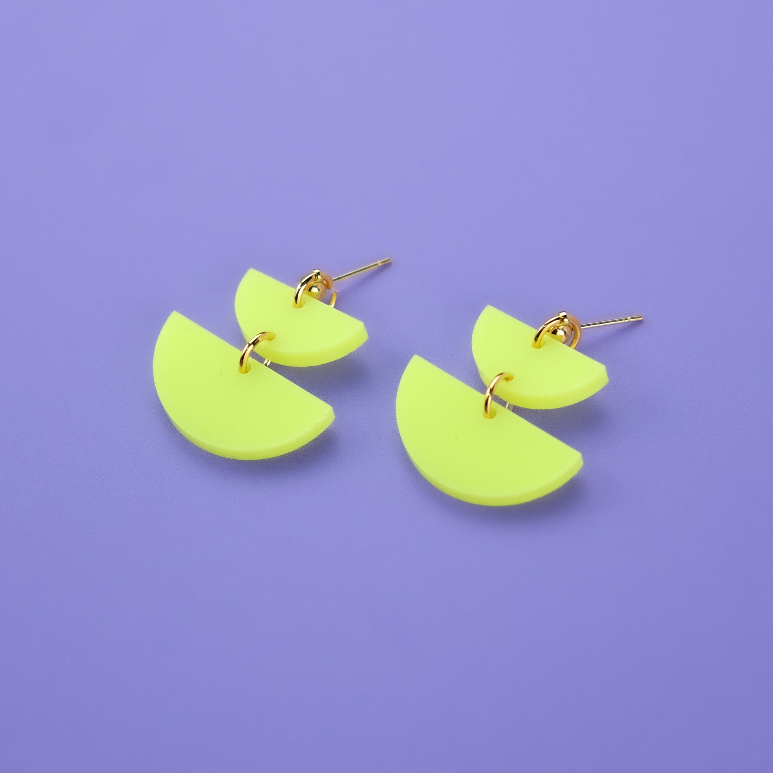 Twin Luna cute dangly half-moon shaped earrings in neon yellow #color_neon-yellow