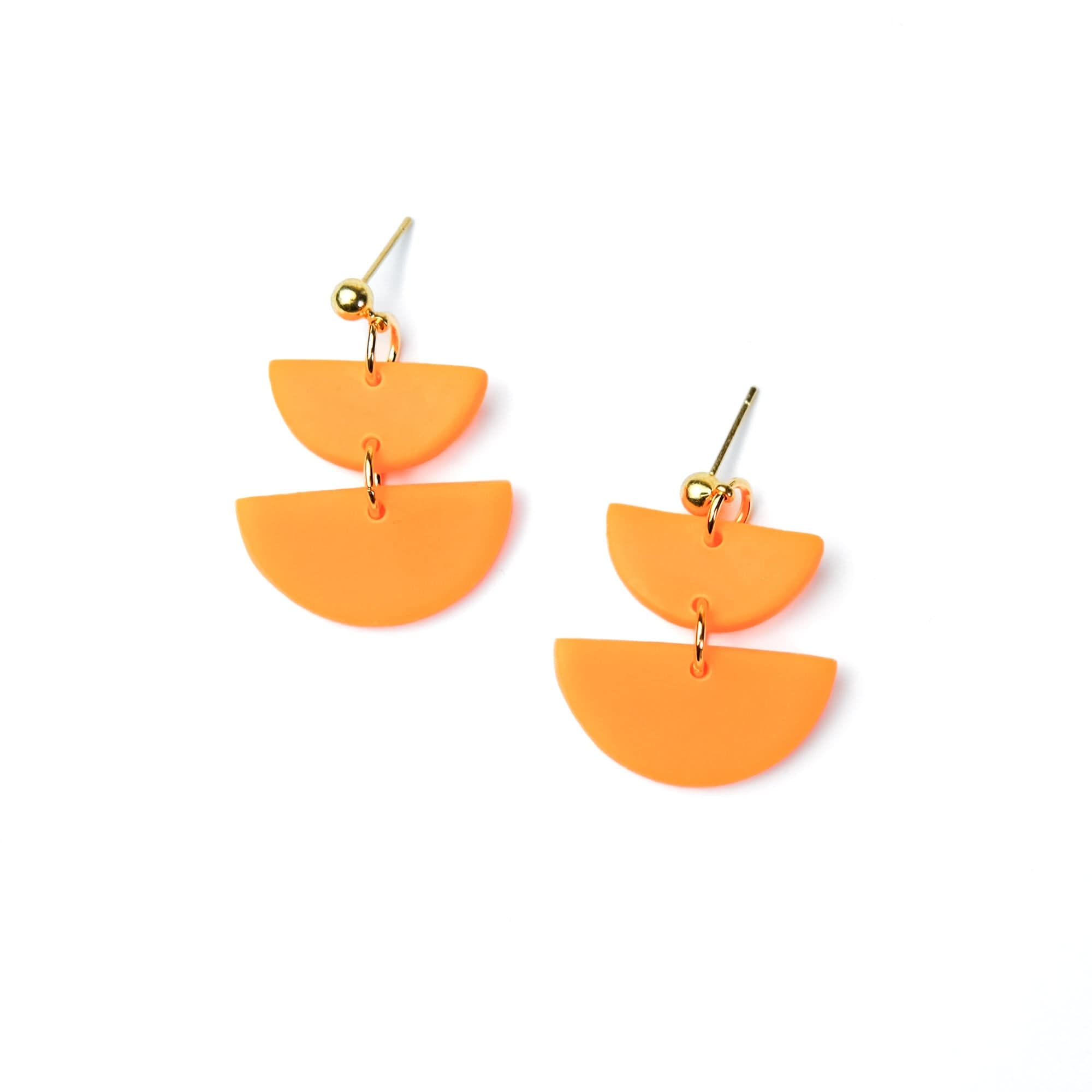 Twin Luna cute dangly half-moon shaped earrings in neon orange #color_neon-orange