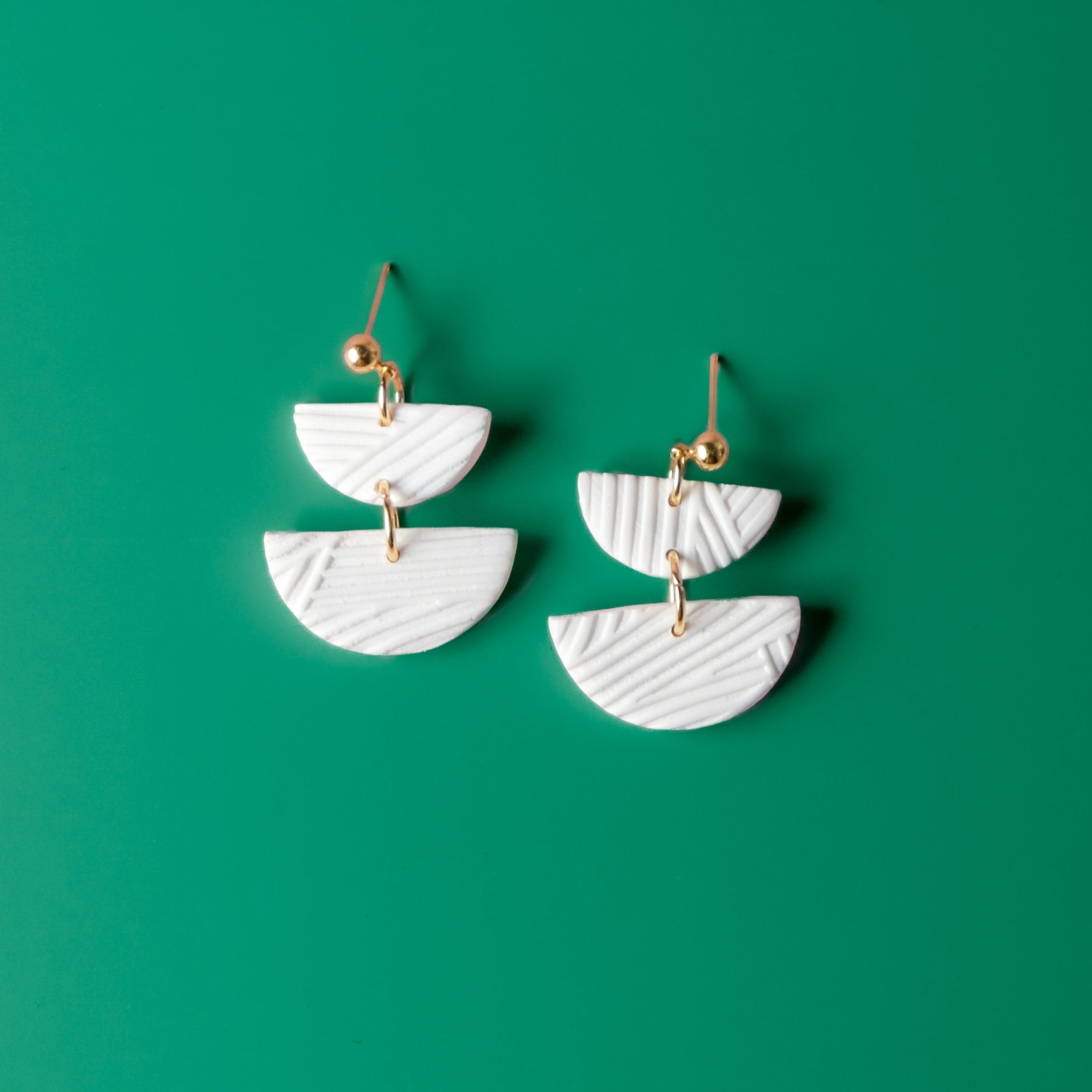 Twin Luna cute dangly earrings #color_white-textured-lines